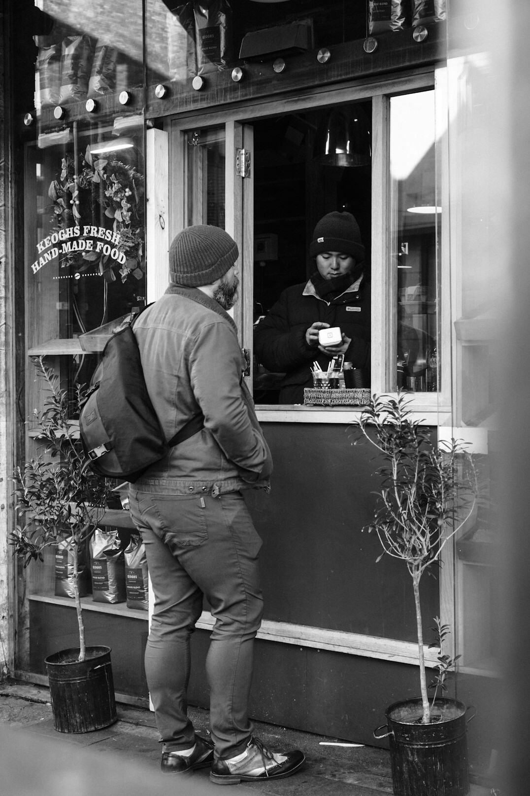 store detective observing suspects
